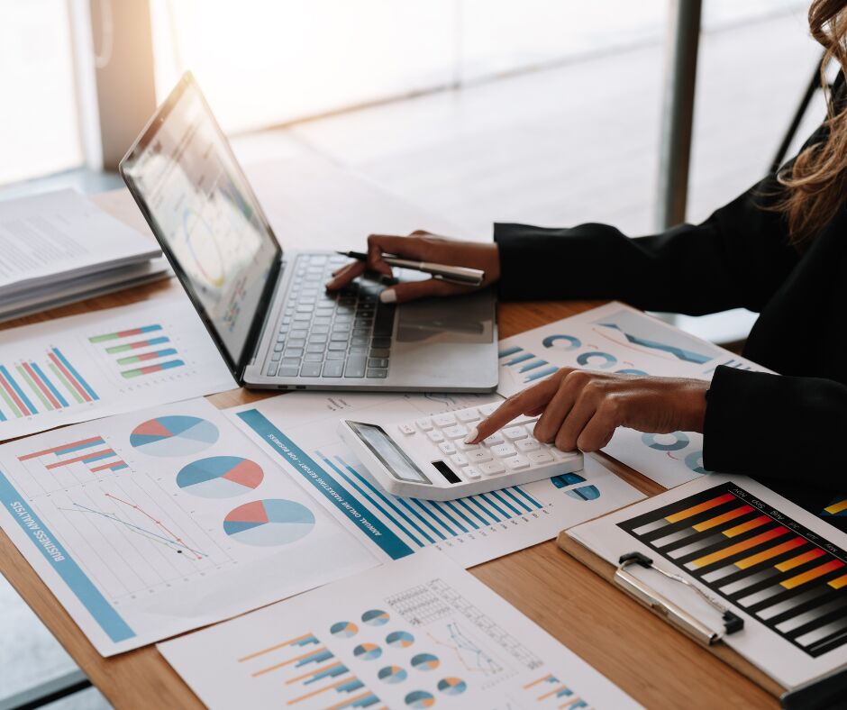 bookkeeping papers and laptop